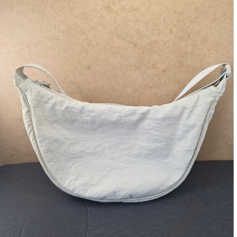 UNIQLO Round Mini Shoulder Bag in color cream